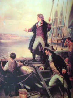 Edward Percy Moran (1912): Francis Scott Key standing on boat with right arm stretched out toward the United States flag flying over Fort McHenry
